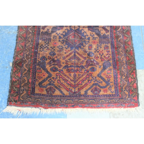 460 - A Vintage Patterned Rug, 140x90cm