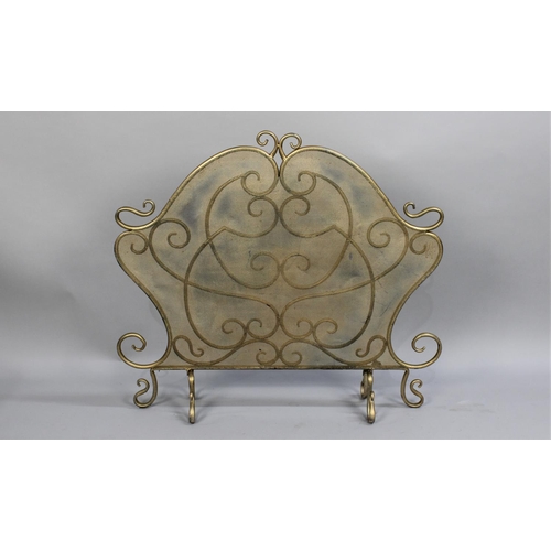 77 - A Gilt Sprayed Wrought Iron Fire Guard, Ornate Form, 88cms Wide