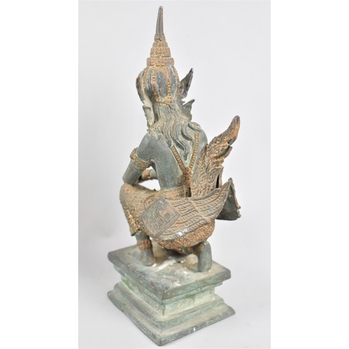 13 - A Patinated and Gilded Bronze Figure of Kneeling Thai Goddess on Rectangular Plinth, 27cms High