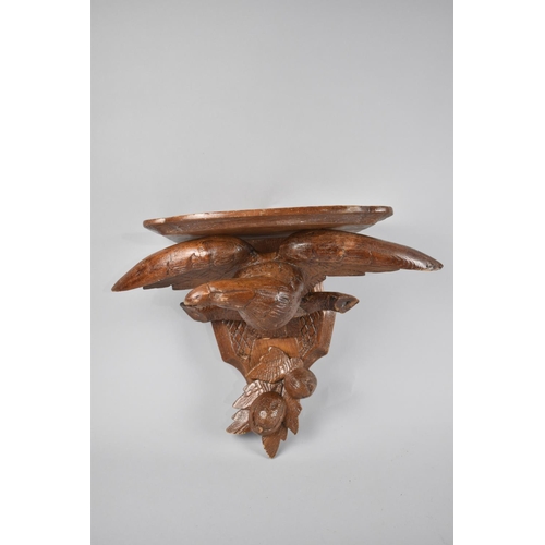 54 - A Mid/Late Black Forest Carved Wall Shelf, Support in the Form of an Eagle with Wings Outstretched, ... 