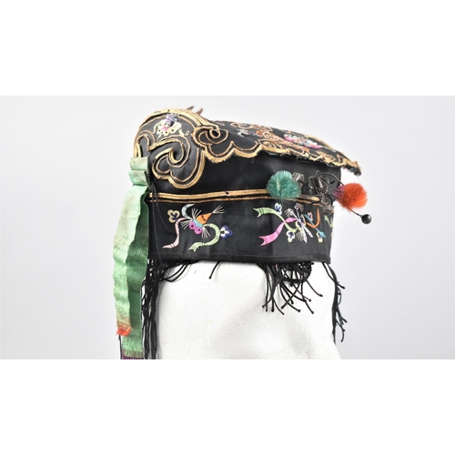 56 - An Early 20th Century Chinese Silk Ceremonial Child's Tiger Wind Hat with Embroidered and Applied Si... 