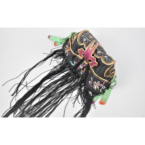 56 - An Early 20th Century Chinese Silk Ceremonial Child's Tiger Wind Hat with Embroidered and Applied Si... 