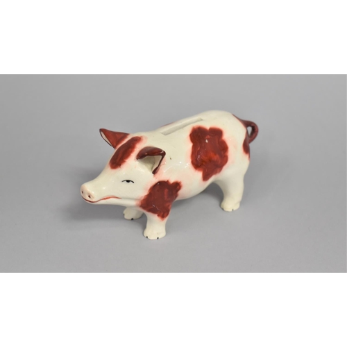 44 - A Glazed Ceramic Novelty Money Box in the Form of a Pig, 13.5cms Long