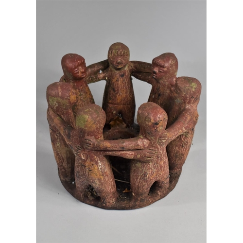 103 - A Modern Aztec Mayan Exterior Tealight Stand in the Form of Circle of Seven Figures, 23cms Diameter