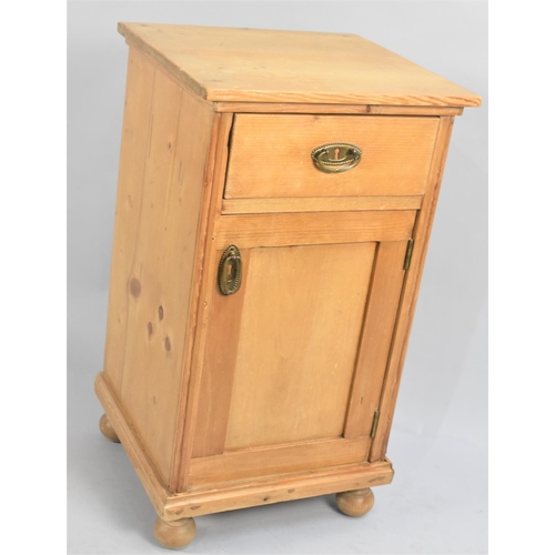 107 - An Edwardian Pine Bedside Cabinet with Top Drawer over Cupboard Base, 39cms Wide