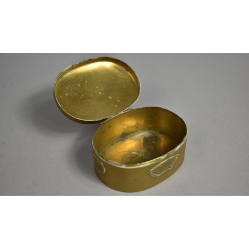 21 - A Vintage Pressed Brass oval Pill Box, Hinged Lid Decorated with Bird and Tree, 5.25cms Wide