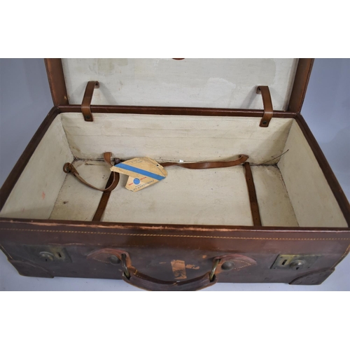 30 - Two Vintage Leather Travelling Trunks, The Smaller Case by Douthwaite's and the Larger H. J. Cave & ... 