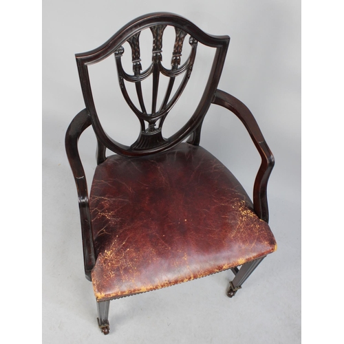 469 - A 19th Century Mahogany Framed Wheel Back Side Chair with Leather Upholstered Seat