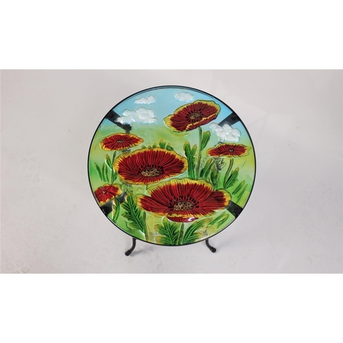 58 - A Modern Folding Metal Framed Circular Table with Coloured Glass Top decorated with Pansies, 36cms D... 