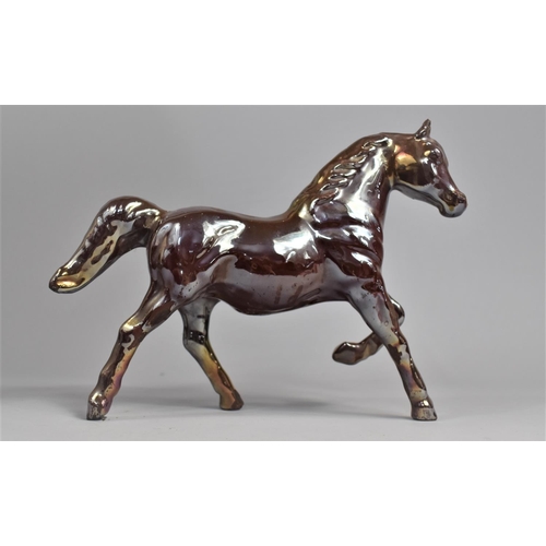 66 - A Heavy Enamelled Cast Metal Study of a Cantering Horse, 27cms Long