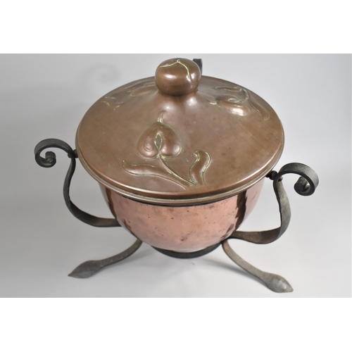 70 - An Early 20th Century Arts and Crafts Copper and Wrought Iron Coal Bucket, the Domed Cover with Embo... 