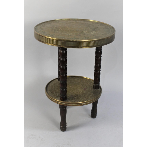 85 - A Mid 20th Century Circular Brass Two Tier Table with Turned Wooden Supports, 50cms Diameter