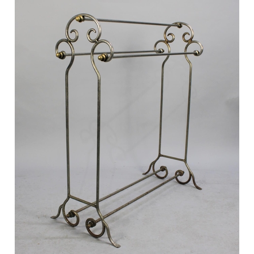 88 - An Edwardian Steel and Brass Towel Rail, 85cms Wide