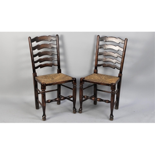 467 - A Pair of Reproduction Rush Seated North Country Style Ladder Back Chairs