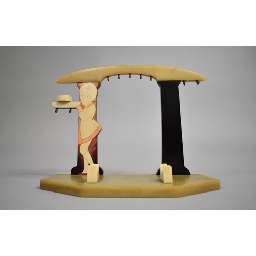 54 - An Mid 20th century Bakelite Stand for a Vanity Set, 120cms Wide and 17cms High