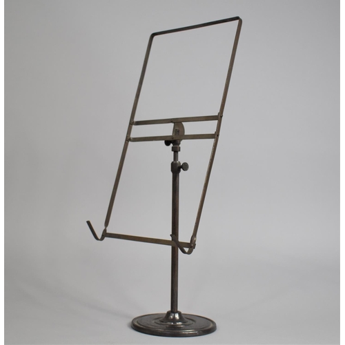 9 - An Early 20th Century Weighted Rise and Fall Music Stand on Circular Foot, 42cms High