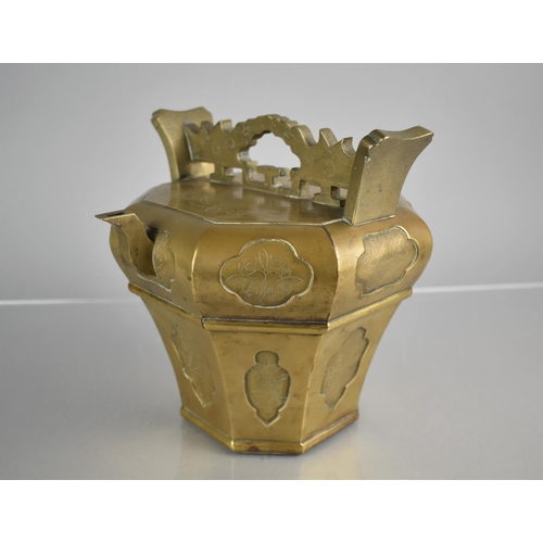 182 - A Chinese Bronze Teapot with Flat Octagonal Top with Ornate Scrolled Handle and Tapering Panelled Bo... 