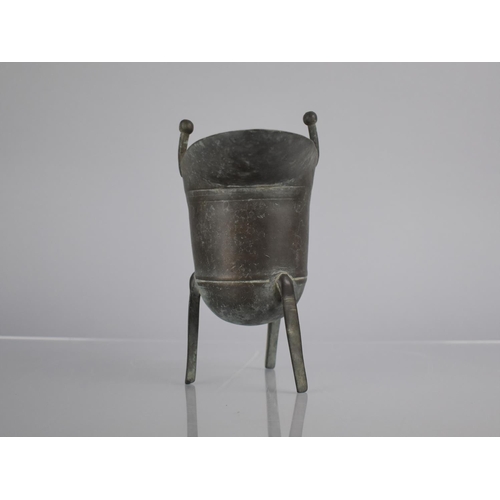 181 - A Chinese Cast Bronze Jue Wine Vessel of Archaic Form, 16.5cm high