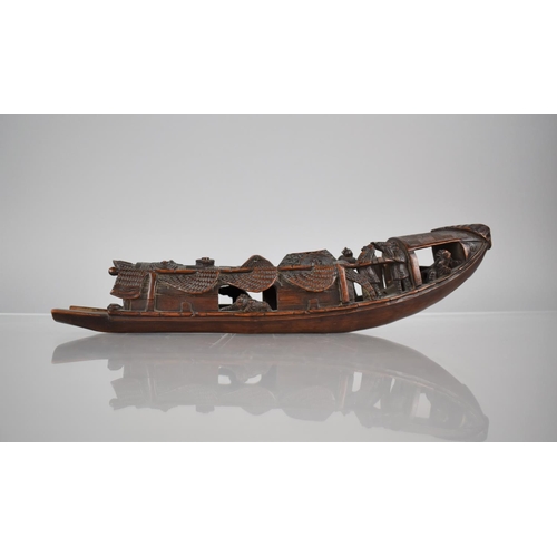 153 - A 19th/20th Century Carved Bamboo Boat, 30cms Long