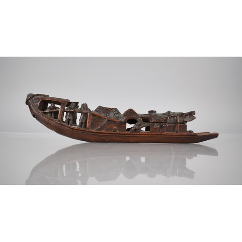 153 - A 19th/20th Century Carved Bamboo Boat, 30cms Long