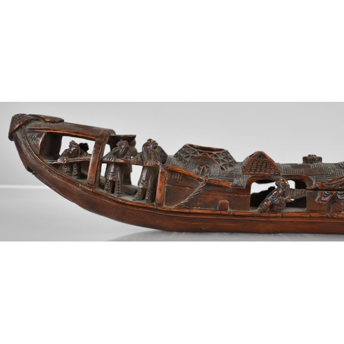 153 - A 19th/20th Century Carved Bamboo Boat, 30cms Long