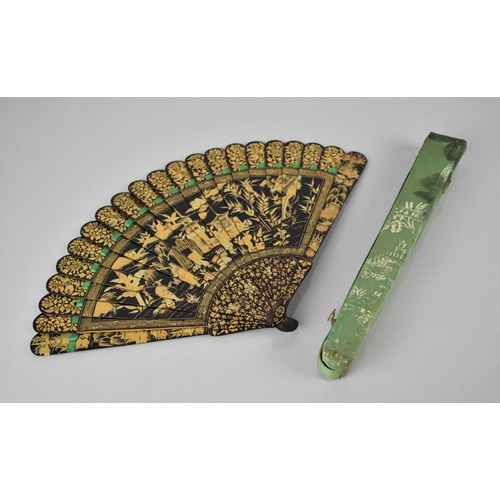 146 - A Late 19th Century Chinese Black Lacquered Brise Fan decorated in Gilt Enamels Depicting Robed Figu... 