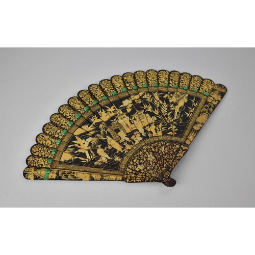 146 - A Late 19th Century Chinese Black Lacquered Brise Fan decorated in Gilt Enamels Depicting Robed Figu... 