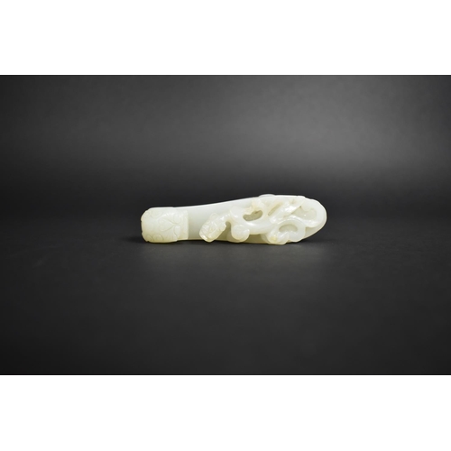 142 - A Chinese White Jade Chi Dragon Belt Buckle, 12cms