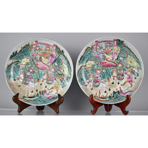 75 - A Pair of Chinese Porcelain Plates Decorated in the Famille Rose Palette with Battle Scene, the Reve... 