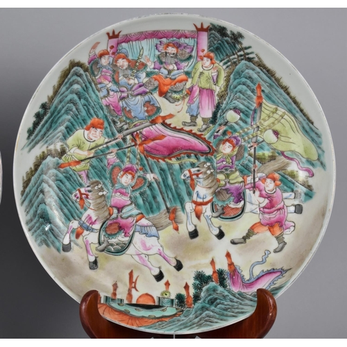 75 - A Pair of Chinese Porcelain Plates Decorated in the Famille Rose Palette with Battle Scene, the Reve... 