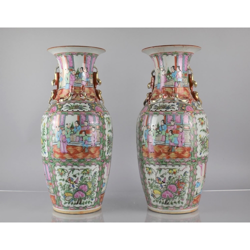 46 - A Large Pair of Chinese Porcelain Famille Rose Medallion Vases decorated in the Usual Manner with Co... 