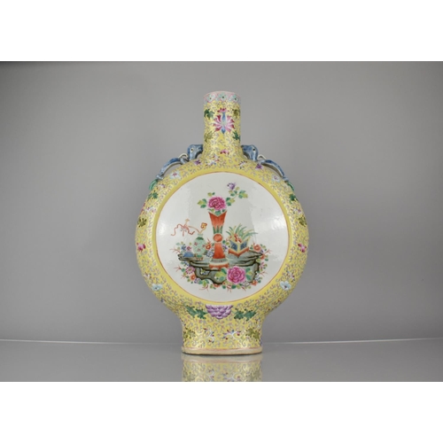 43 - A 19th Century Chinese Porcelain Yellow Ground Famille Rose Moon Flask Decorated with Circular Carto... 