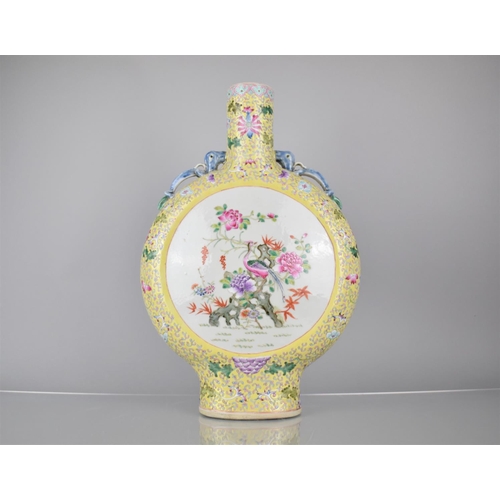 43 - A 19th Century Chinese Porcelain Yellow Ground Famille Rose Moon Flask Decorated with Circular Carto... 