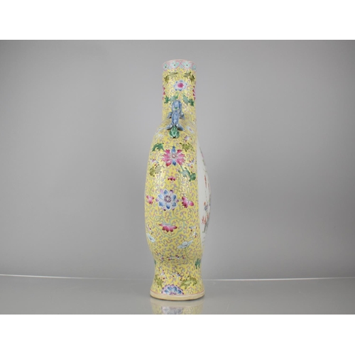 43 - A 19th Century Chinese Porcelain Yellow Ground Famille Rose Moon Flask Decorated with Circular Carto... 