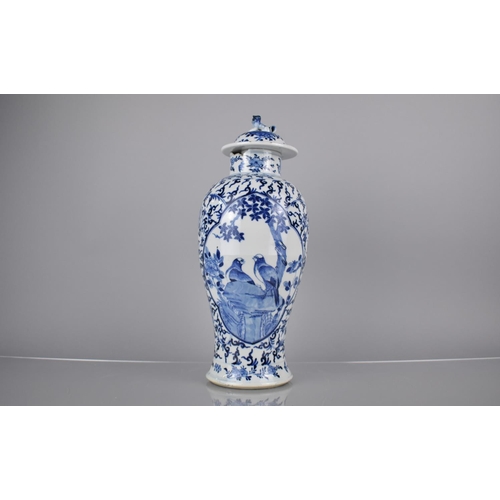 19 - A 19th Century Chinese Porcelain Blue and White Baluster Vase and Cover Decorated with Quatrefoil Ca... 