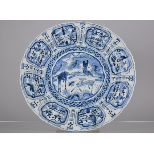 10 - An Early Chinese Porcelain, Probably Kangxi Period (1662-1722) Blue and White Plate Decorated with C... 