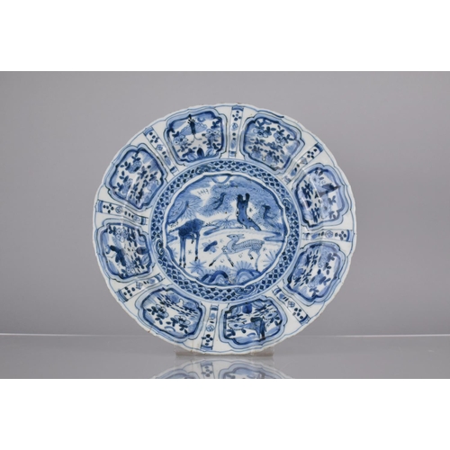 10 - An Early Chinese Porcelain, Probably Kangxi Period (1662-1722) Blue and White Plate Decorated with C... 