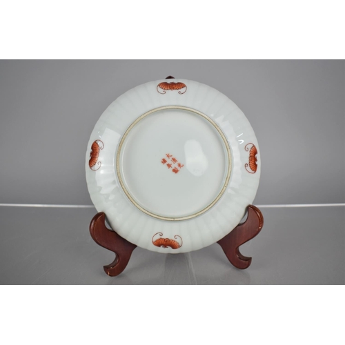 79 - A Chinese Porcelain Dish of Reeded Form decorated in the Fencai Palette with Central Red Dragon Surr... 