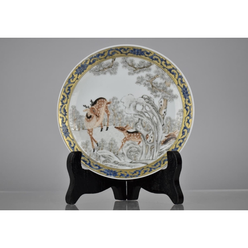 84 - An 18th Century Chinese Porcelain Grisaille Saucer decorated with Deer in Woodland Setting, Enriched... 