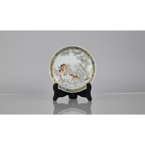 84 - An 18th Century Chinese Porcelain Grisaille Saucer decorated with Deer in Woodland Setting, Enriched... 