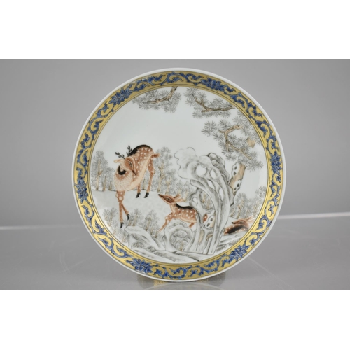 84 - An 18th Century Chinese Porcelain Grisaille Saucer decorated with Deer in Woodland Setting, Enriched... 