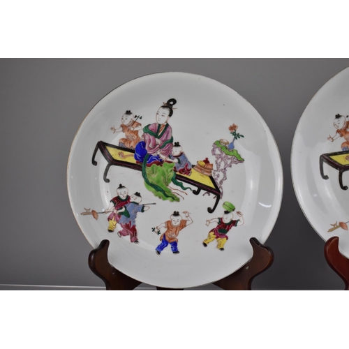 95 - A Pair of Chinese Porcelain Plates Decorated in Polychrome Enamels with Mother and Children, the Rev... 