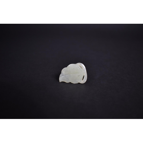 140 - A Chinese White Jade Pebble Carving of Cat Seated on Leaf, 3cms by 1cms High