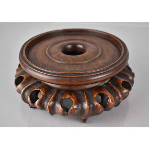 167 - A Chinese Hardwood Carved and Pierced Vase Stand to Fit 12cms Diameter Base, 6cms High