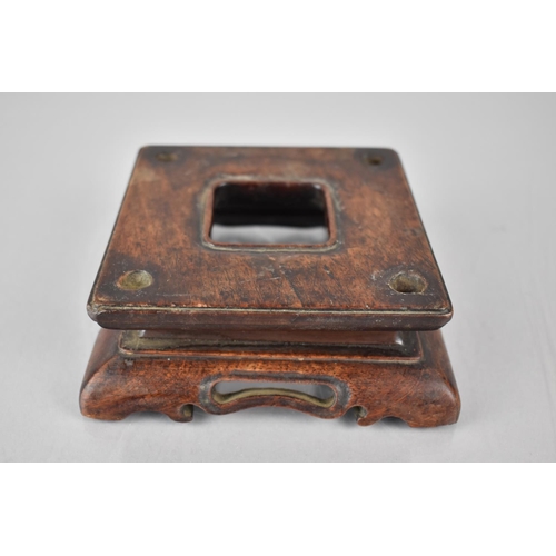 166 - A Chinese Carved and Pierced Hardwood Stand of Square Form, 10cms Square Top and 4cms High