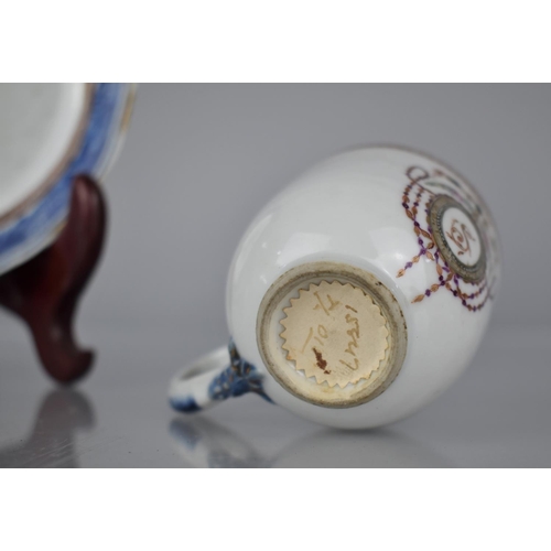 59 - An 18th Century Chinese Porcelain Export Cup and Saucer Decorated with Blue Underglaze Trim and Havi... 