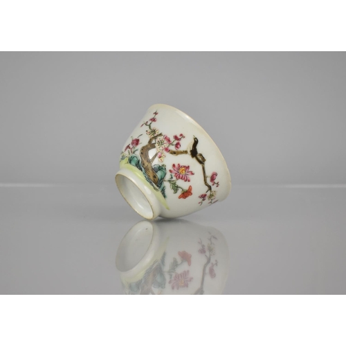 82 - A 19th Century Chinese Porcelain Famille Rose Fencai Tea Bowl Decorated with Bird Perched in Blossom... 