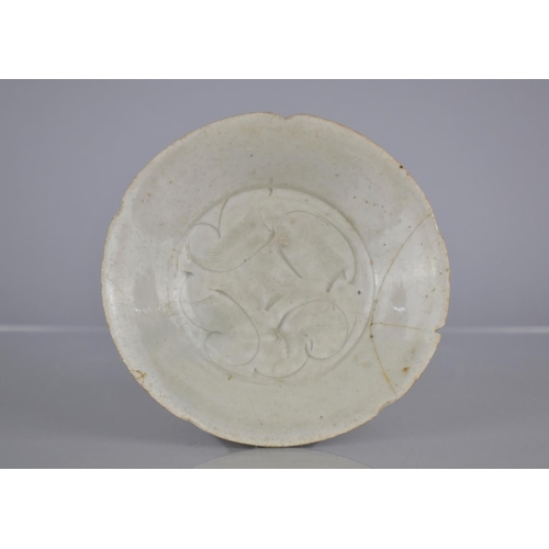 118 - A Chinese Longquan Celadon Dish with Shallow Tapering Shaped Rim and Incised Design, 14.5cm diameter... 