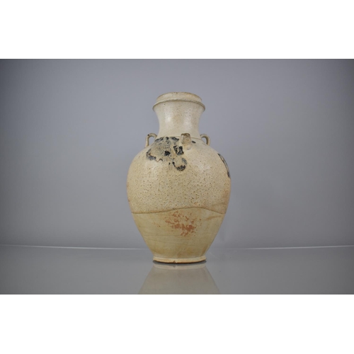 122 - A Chinese Pottery Iron Splashed Ewer, the Ovoid Body on Circular Foot, with Spout and Ribbed Lop Han... 