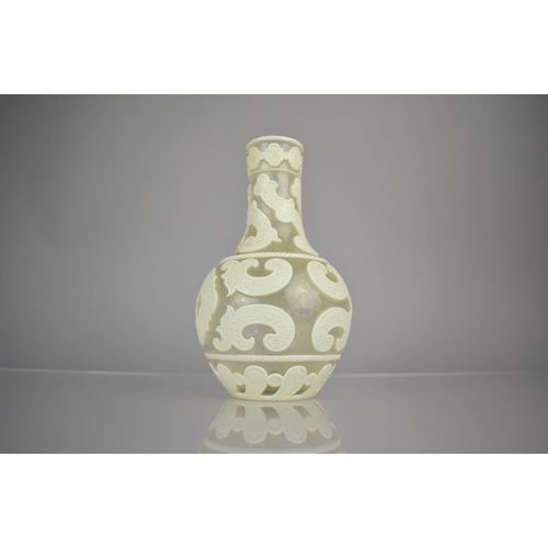 132 - An Overlay Glass Vase Well Worked with Scrolled Cream Carved Overlay Decorated in a Floral Motif, 19... 